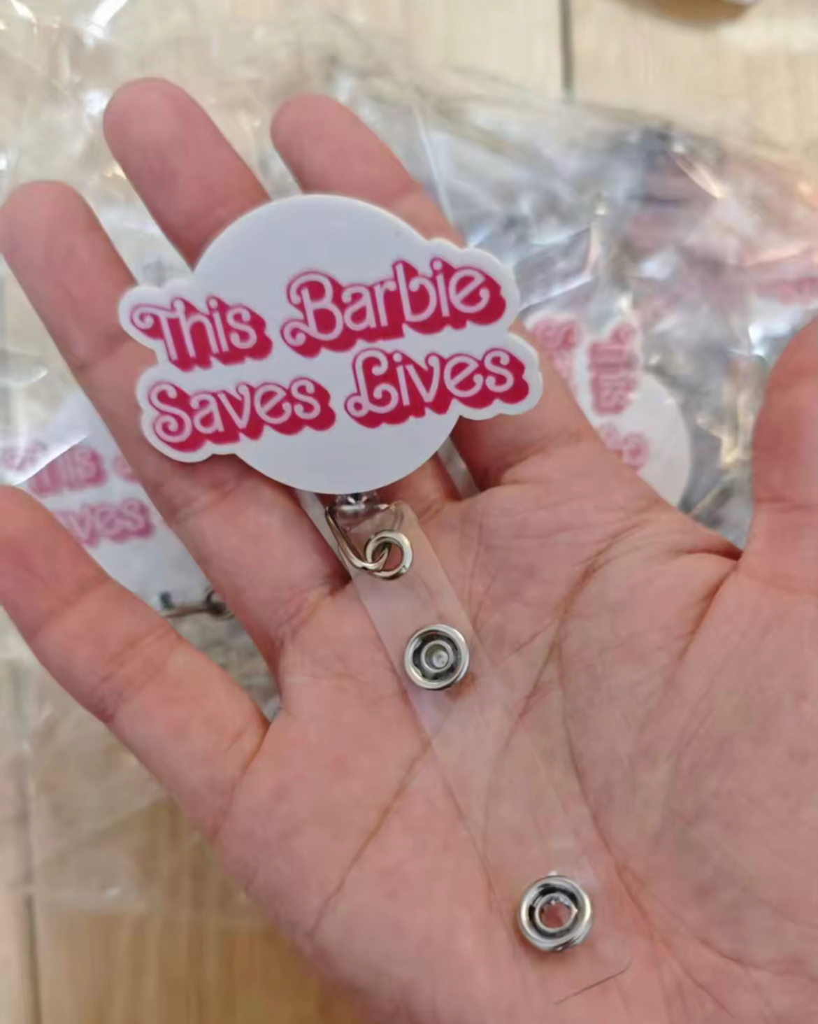 barbie reel badge